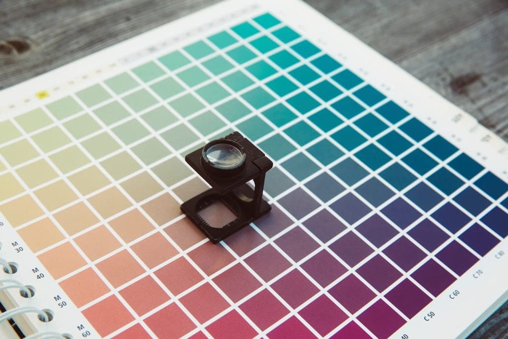 Colour proofing chart under a loupe