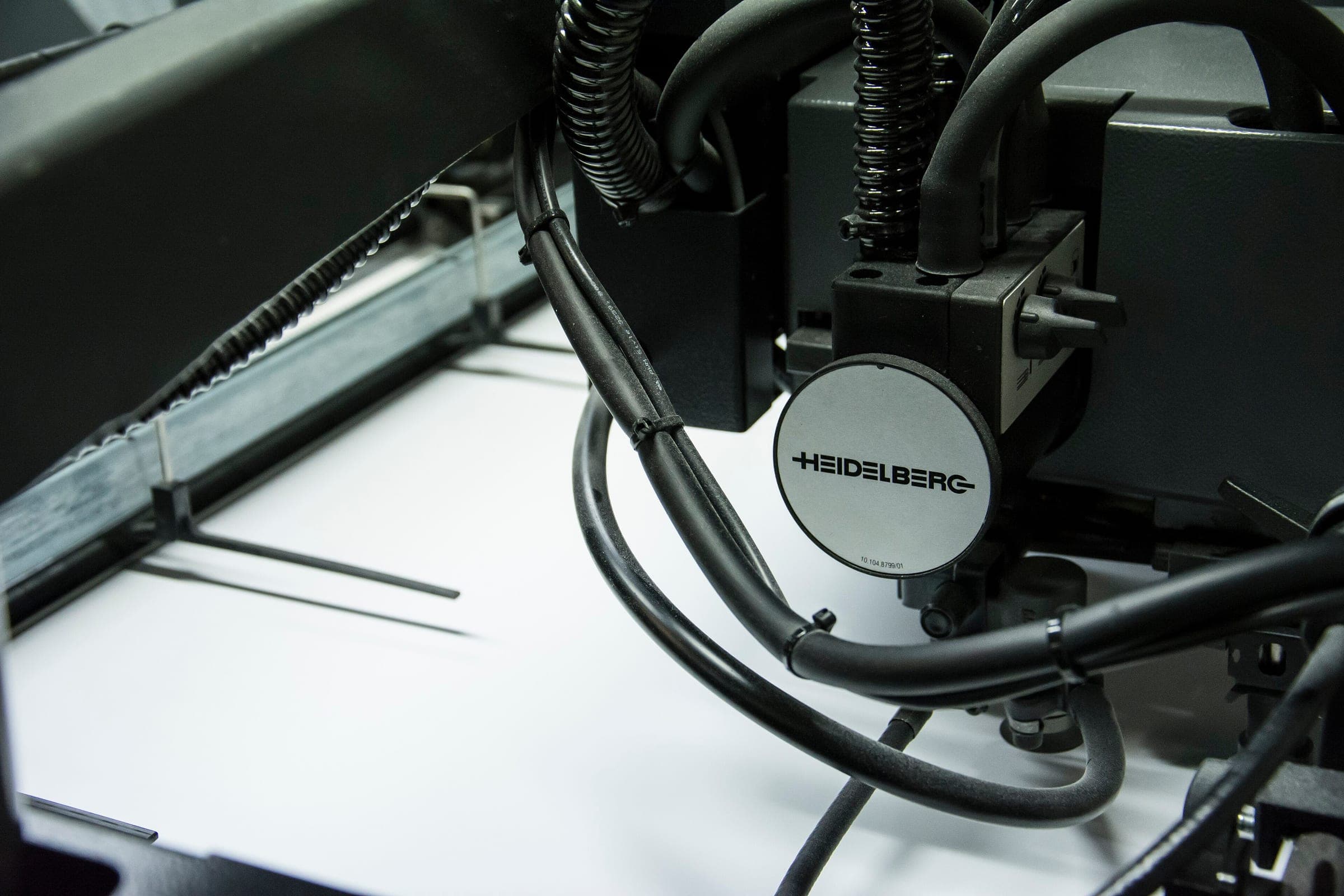 Modern printing press running a job